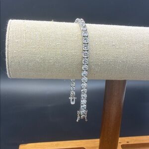 Elegant Silver Tone Bracelet with Clear Stones (not diamonds)
